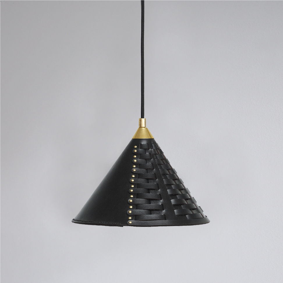 Koni lamp Uniqka small in black leather, with messing colored metal details