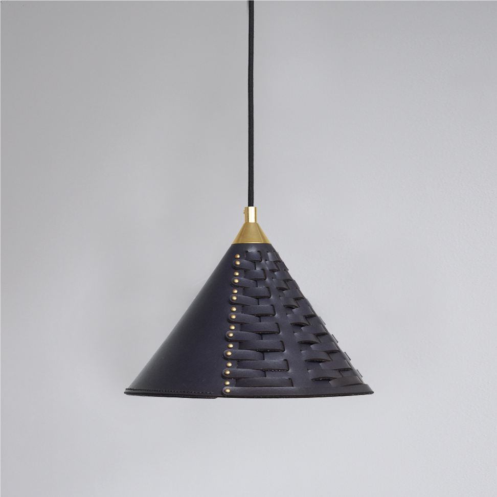 Koni Lamp Uniqka small in navy blue leather with messing colored metal details
